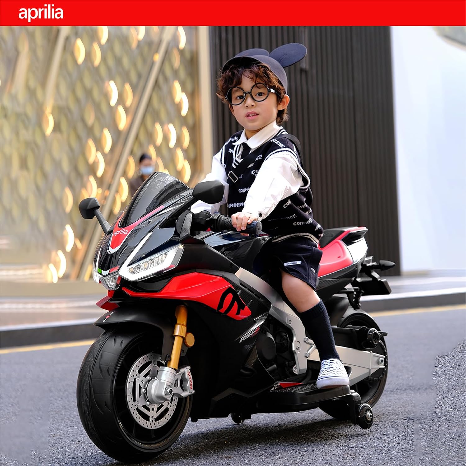 TCARAIWEN Aprilia Licensed 24V Kids Electric Motorcycle,Ride-On Motorcycle Speed Up to 8mph with Side Wheels, Key Switch and Mp3 (Normal Motors - 24V, Black)
